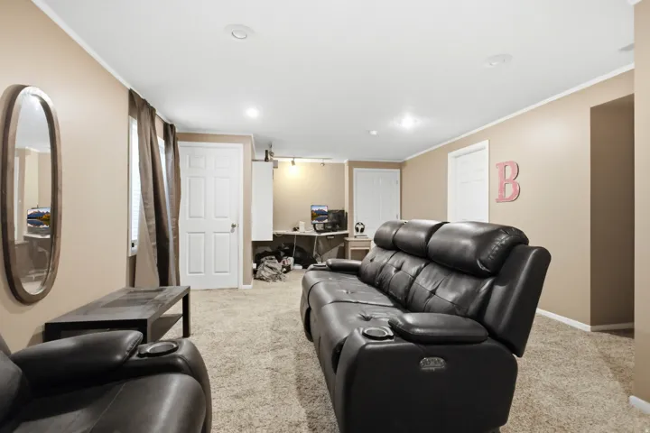 Carpeted room featuring recessed lighting and neutral-toned walls