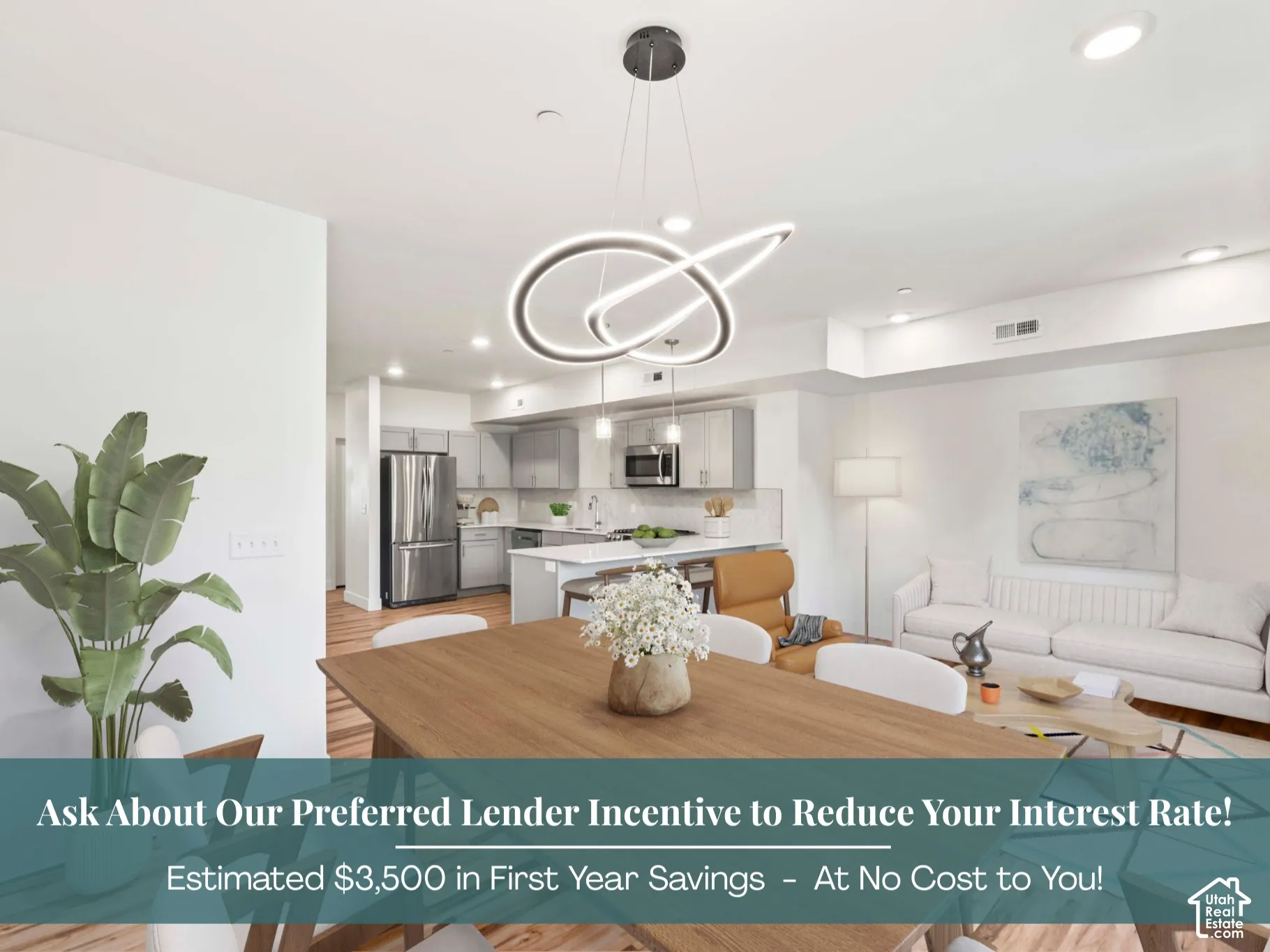Open-concept living space featuring LVP flooring, recessed lighting, and a modern chandelier