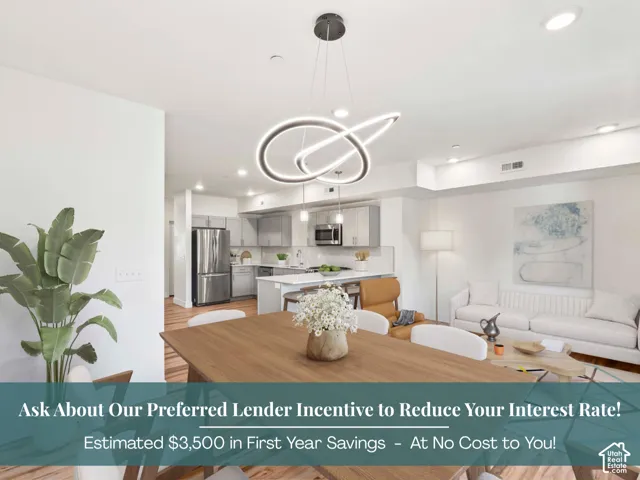Open-concept living space featuring LVP flooring, recessed lighting, and a modern chandelier