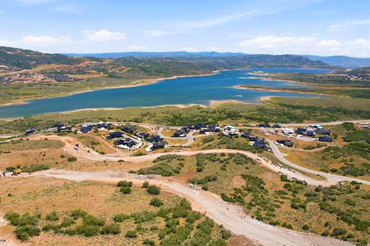 Expansive aerial perspective showcasing a residential development with numerous properties