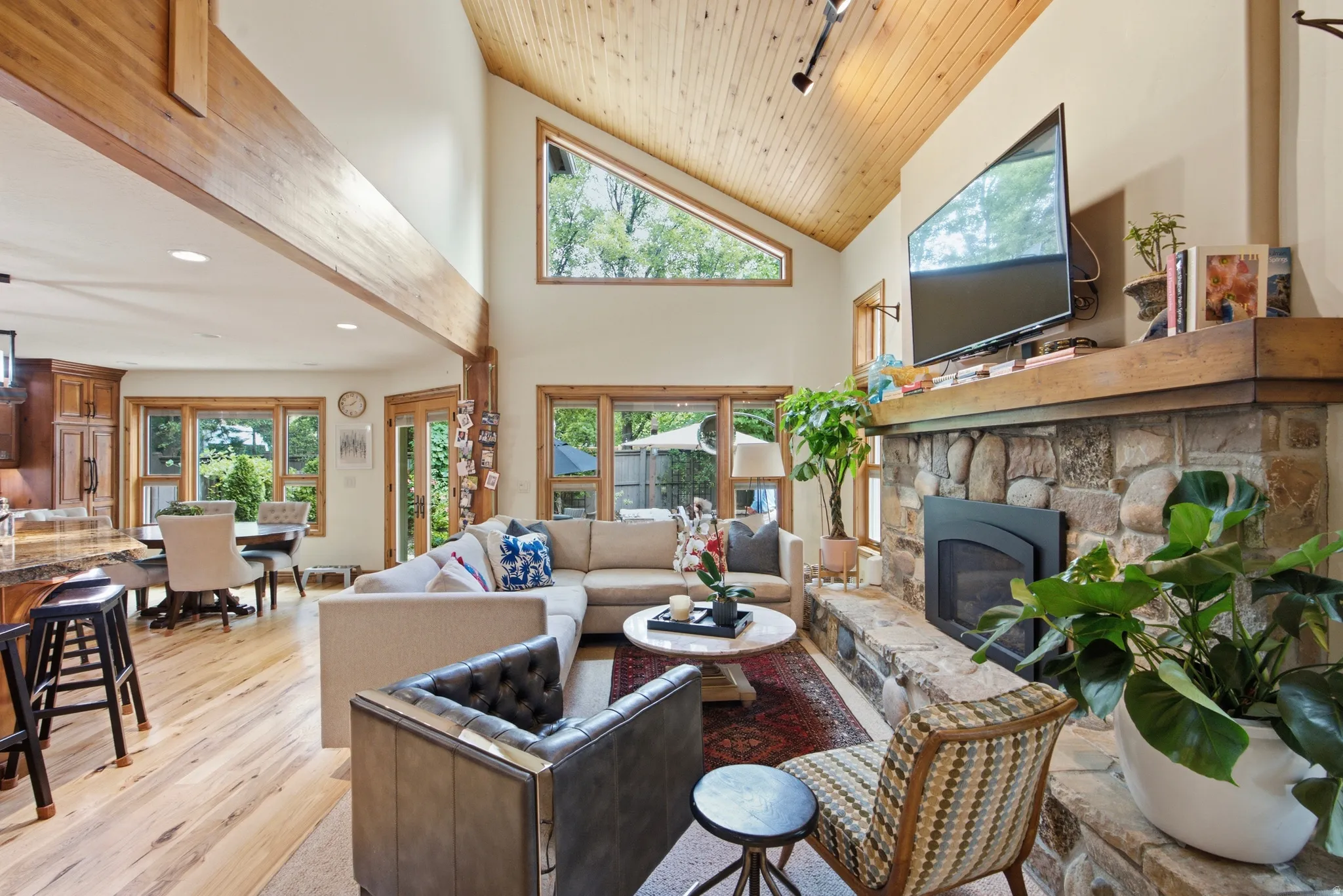 Vaulted wood-paneled ceiling with exposed wood beams