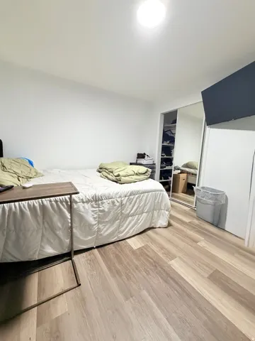 Bright room with light wood-finish flooring