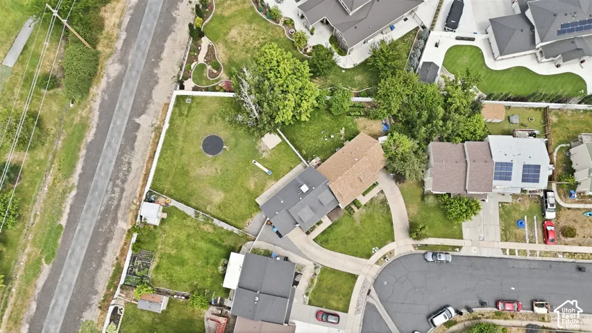 View of backyard and trail with direct trail access through back gate.
