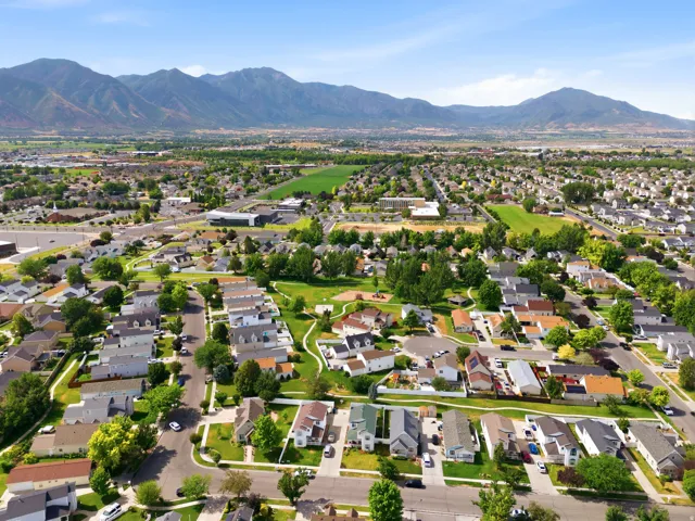 Expansive residential area featuring a diverse collection of single-family homes, mature landscaping, and tree-lined streets
