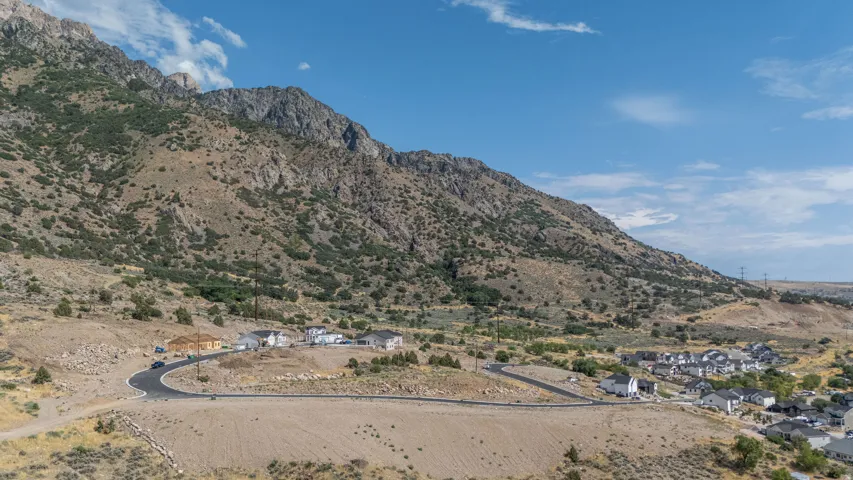 Mountainous terrain backdrop featuring residential development
