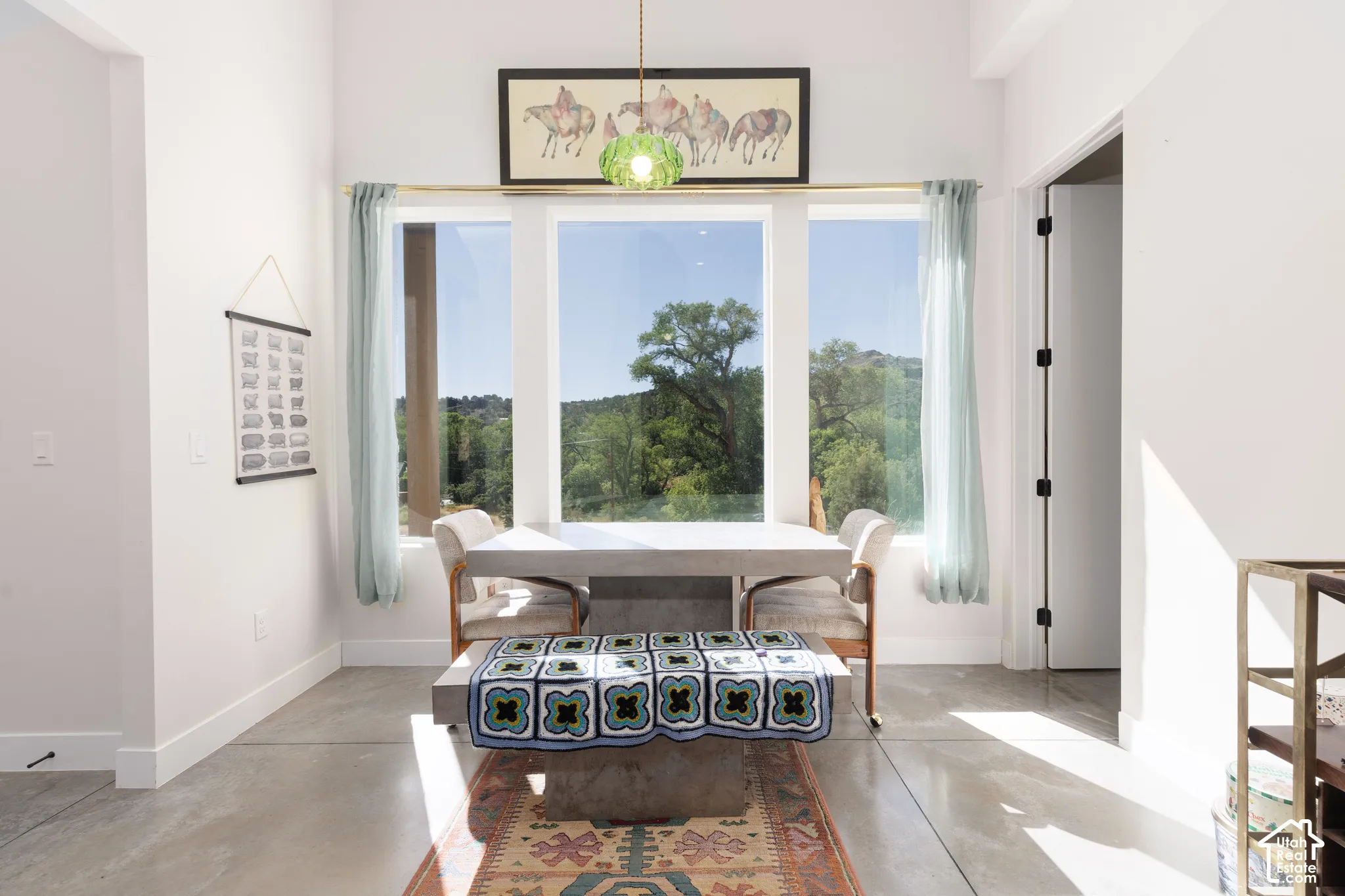 Floor-to-ceiling windows with expansive outdoor scenery