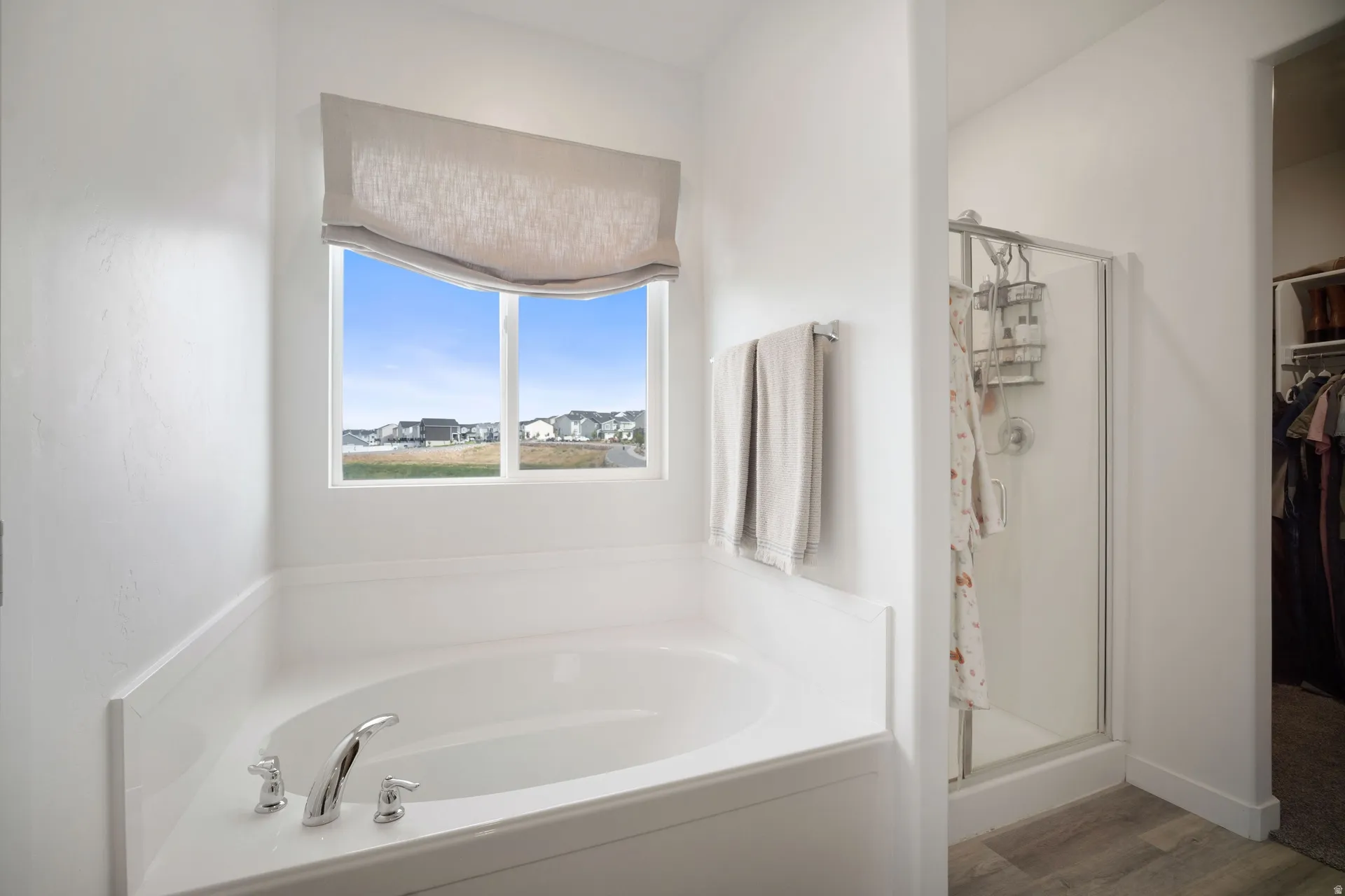 Soaking tub with polished chrome fixtures