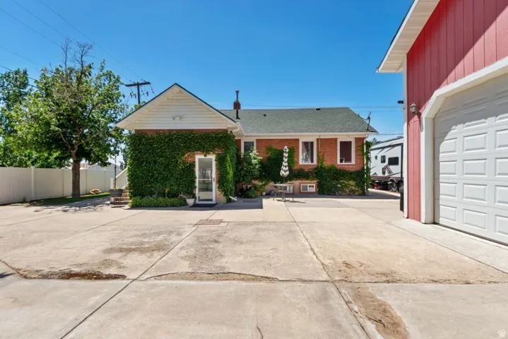 Gorgeous Ivy on the back of the home and tons of parking, entertaining space