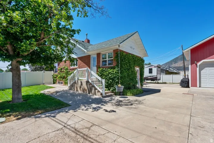 Exterior of home with additional parking and  RV Parking