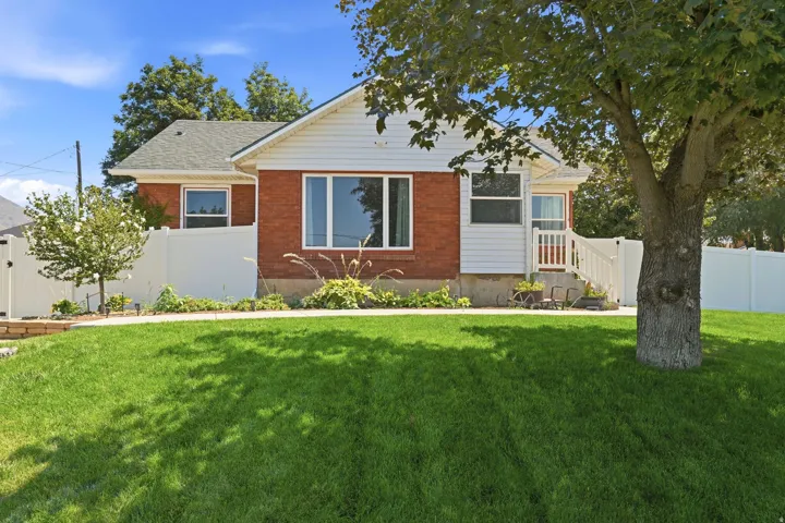 Brick and siding exterior with a gabled roof