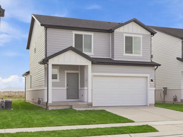 Two-story exterior with horizontal siding and board-and-batten accents