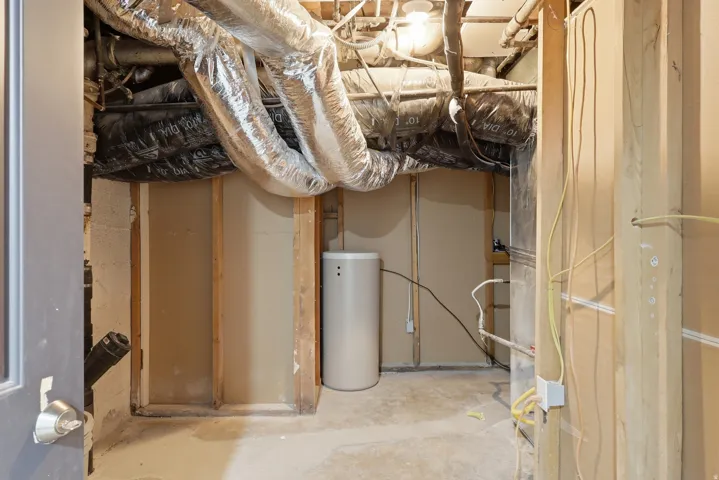 Utility space in the basement. Space to add a 2nd laundry room.