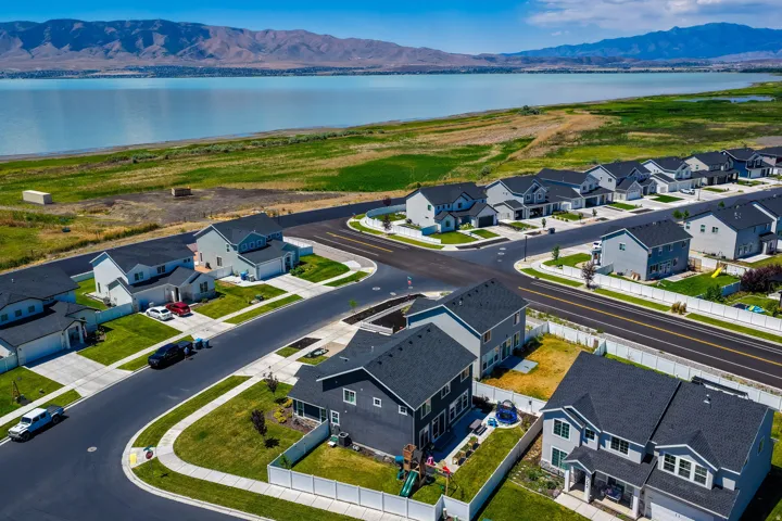 Newly constructed residential community featuring contemporary architectural styles and paved roadways