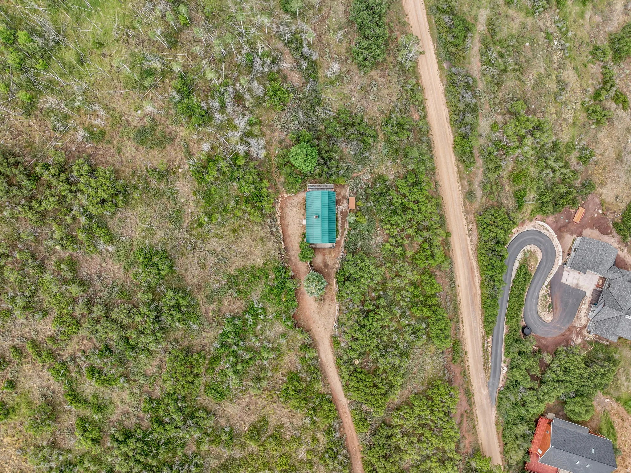 The cabin sits on a 1-acre parcel, and an adjacent 1-acre lot with a separate tax ID may be included with a reasonable offer, bringing the total property size to 2 acres.