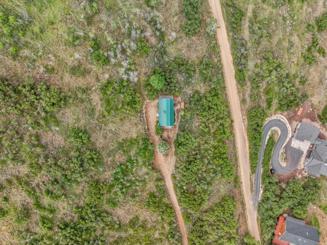 The cabin sits on a 1-acre parcel, and an adjacent 1-acre lot with a separate tax ID may be included with a reasonable offer, bringing the total property size to 2 acres.