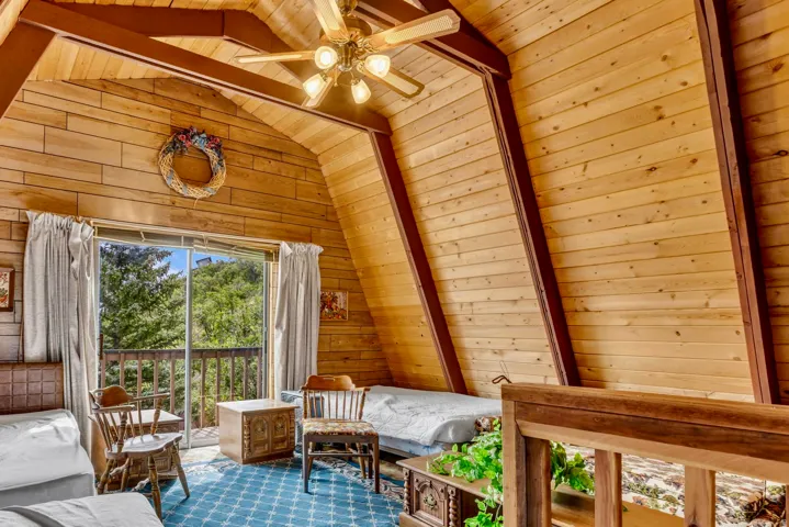 This spacious top floor den has comfortably served as a 3rd bedroom for visiting family.