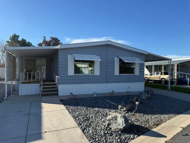 Light blue exterior siding with white trim