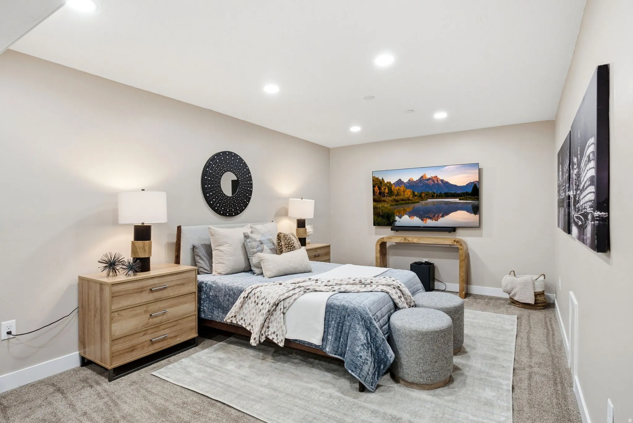 Spacious room featuring neutral wall tones, recessed lighting, and carpet flooring