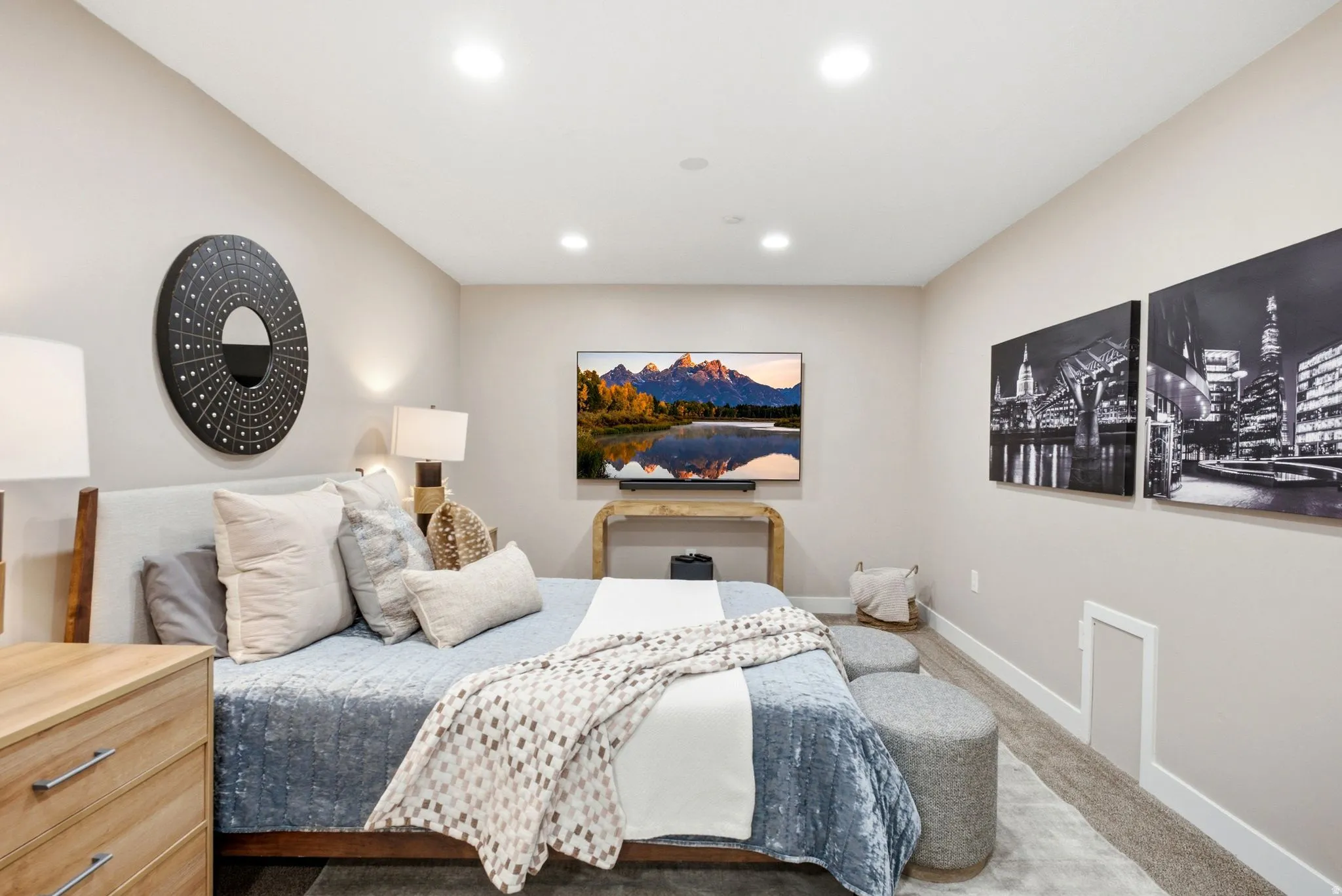 Recessed lighting illuminates neutral-toned walls