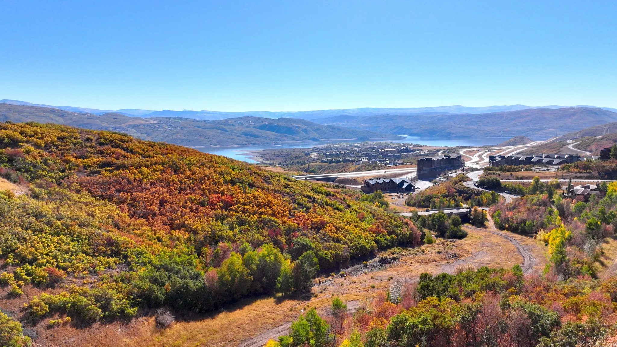 Rolling hillside property with seasonal foliage