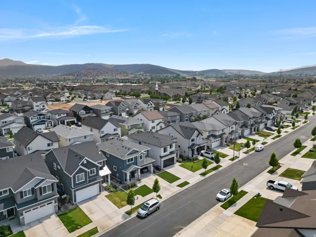 Aerial perspective showcasing a residential development with a consistent architectural style