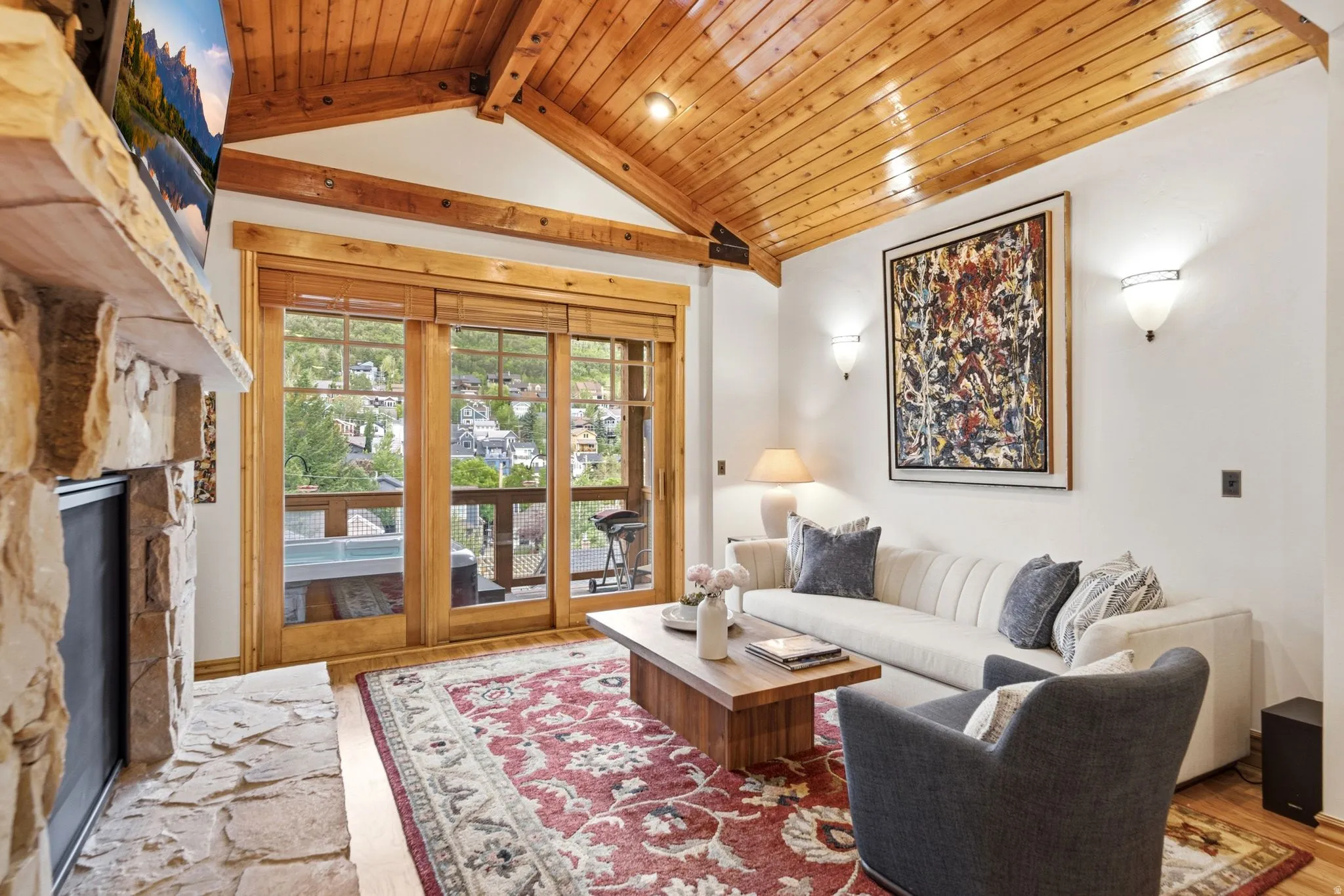 Vaulted wood-paneled ceiling with exposed beams