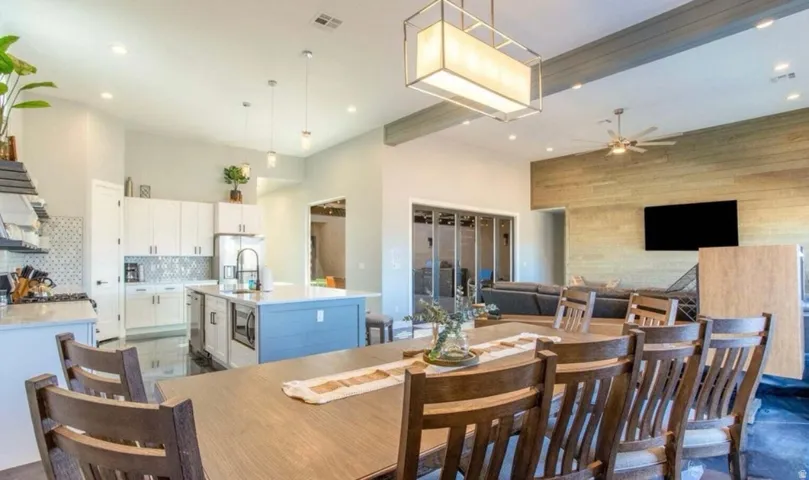 Open-concept living space with a dining area, kitchen, and living room