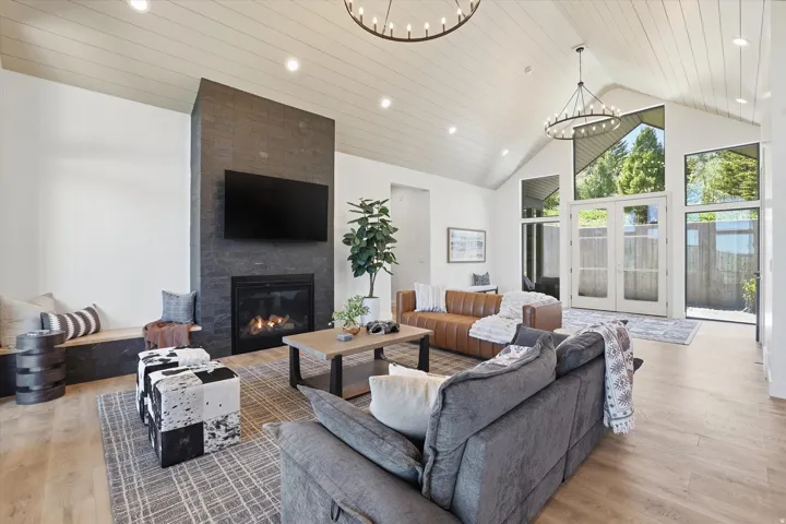 Vaulted ceilings featuring horizontal wood paneling and recessed lighting