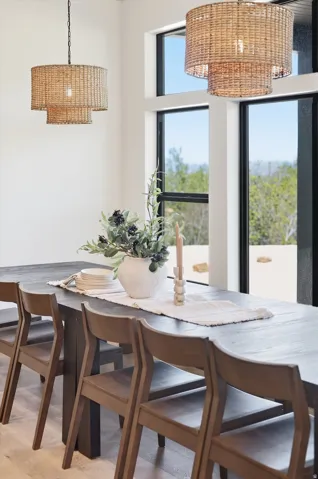 Dining area featuring a dark wood-finish table with coordinating chairs