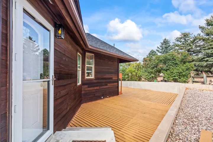 Expansive exterior decking with wood-finish planks
