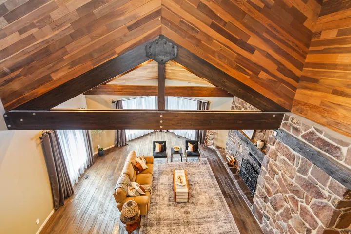 Vaulted wood-paneled ceiling with exposed beams