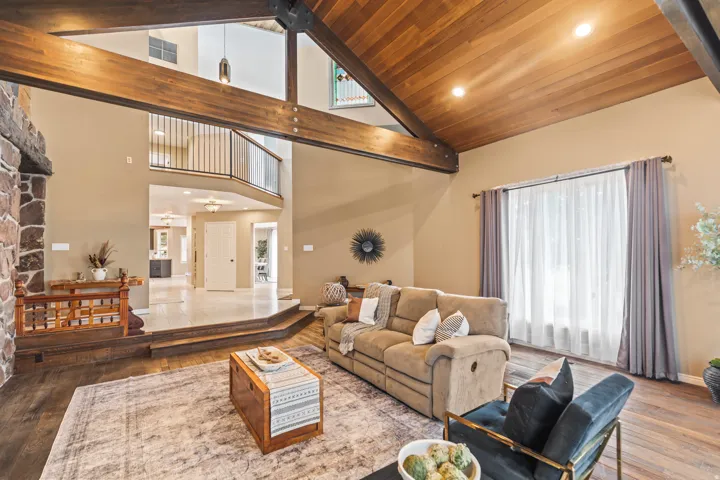 Vaulted wood-paneled ceiling with exposed beams