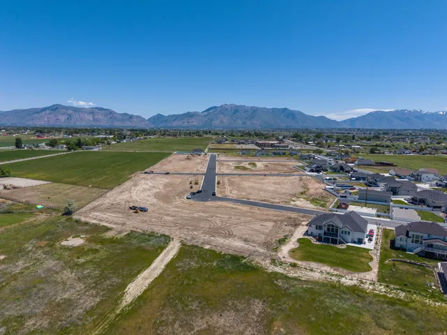 Expansive land parcel with visible road infrastructure for development
