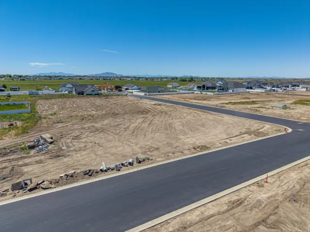 Expansive building lot with newly paved streets and concrete curbing