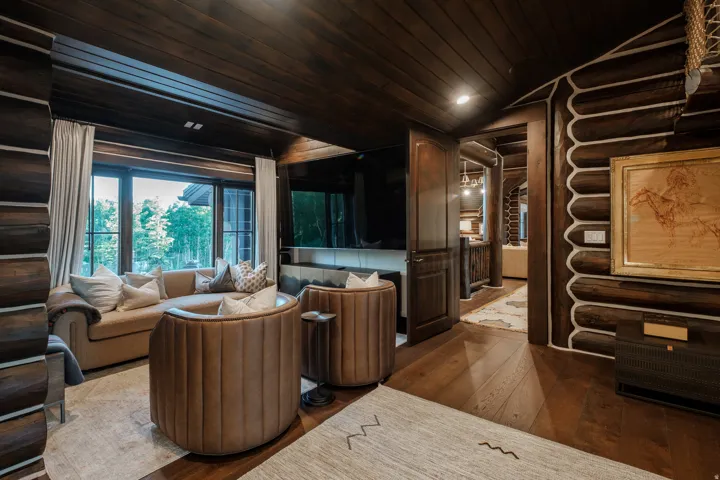 Room featuring wood-finish flooring and a wood-paneled ceiling
