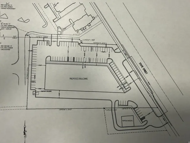 Site Plan. Illustrating the proposed building footprint and associated parking areas on the property