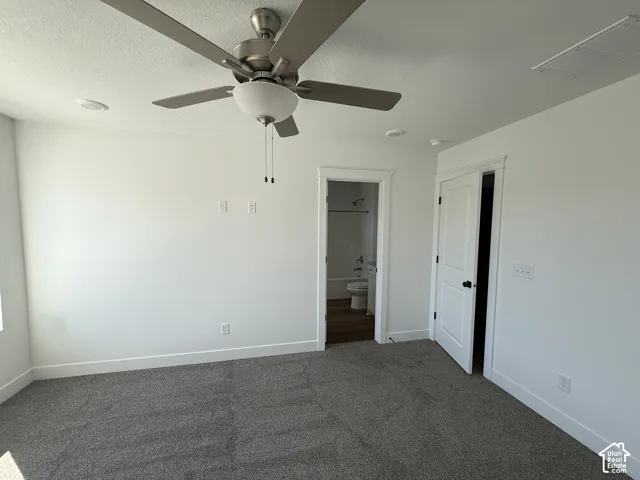 Neutral wall paint, ceiling fan with light fixture, recessed lighting, carpet flooring, and white trim