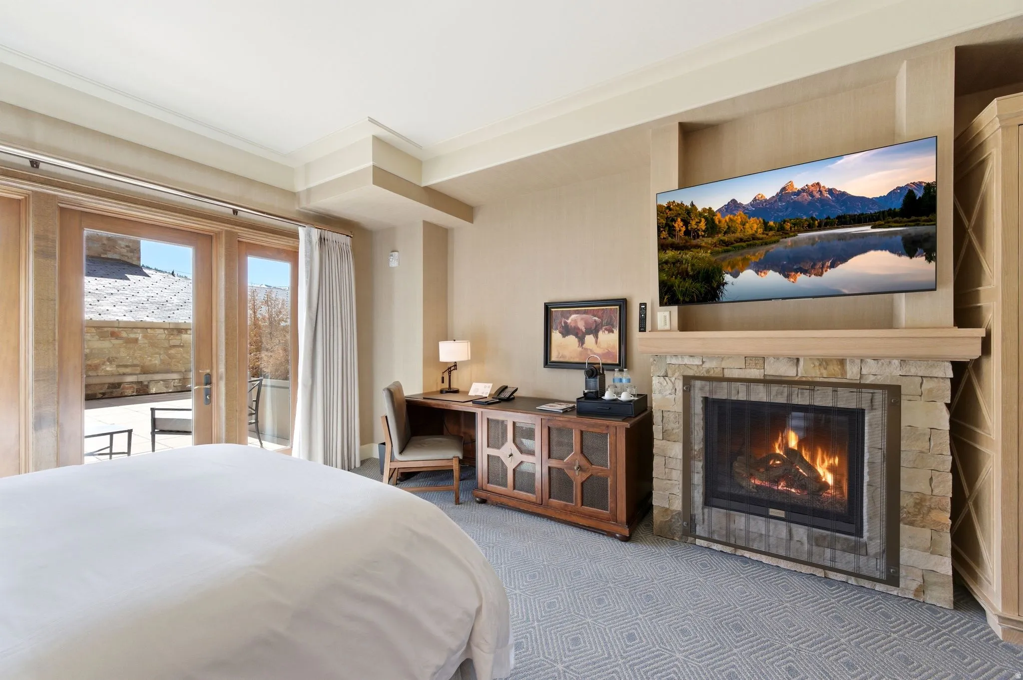 Interior room featuring double French doors opening to an outdoor patio