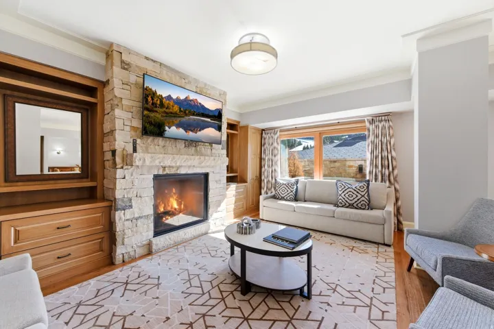 Stone-clad fireplace with a built-in media center