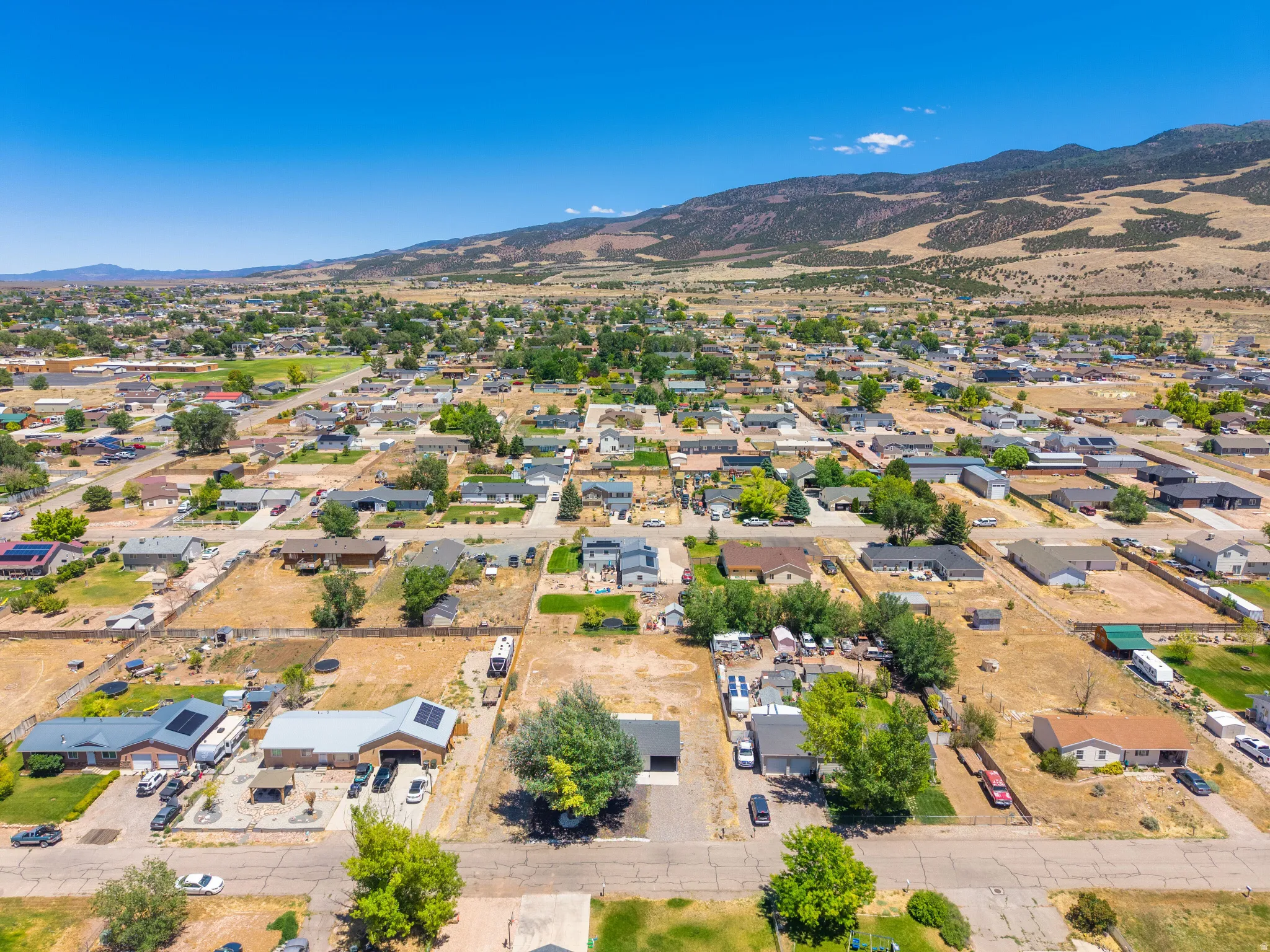 Aerial perspective showcasing a residential neighborhood with varied housing styles