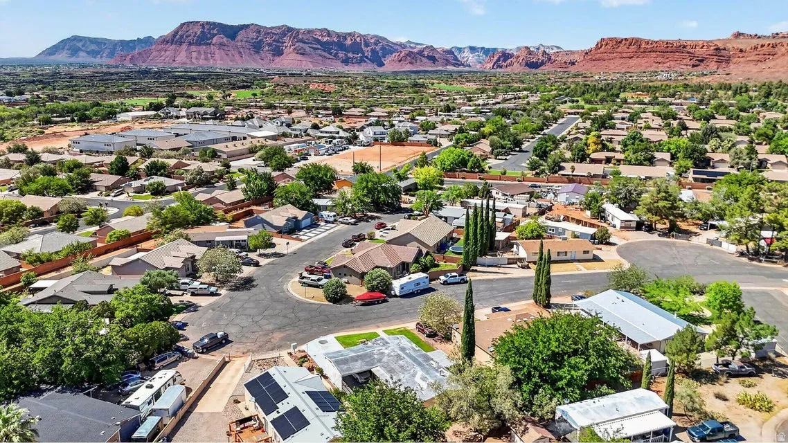 Residential neighborhood featuring a cul-de-sac and mature landscaping