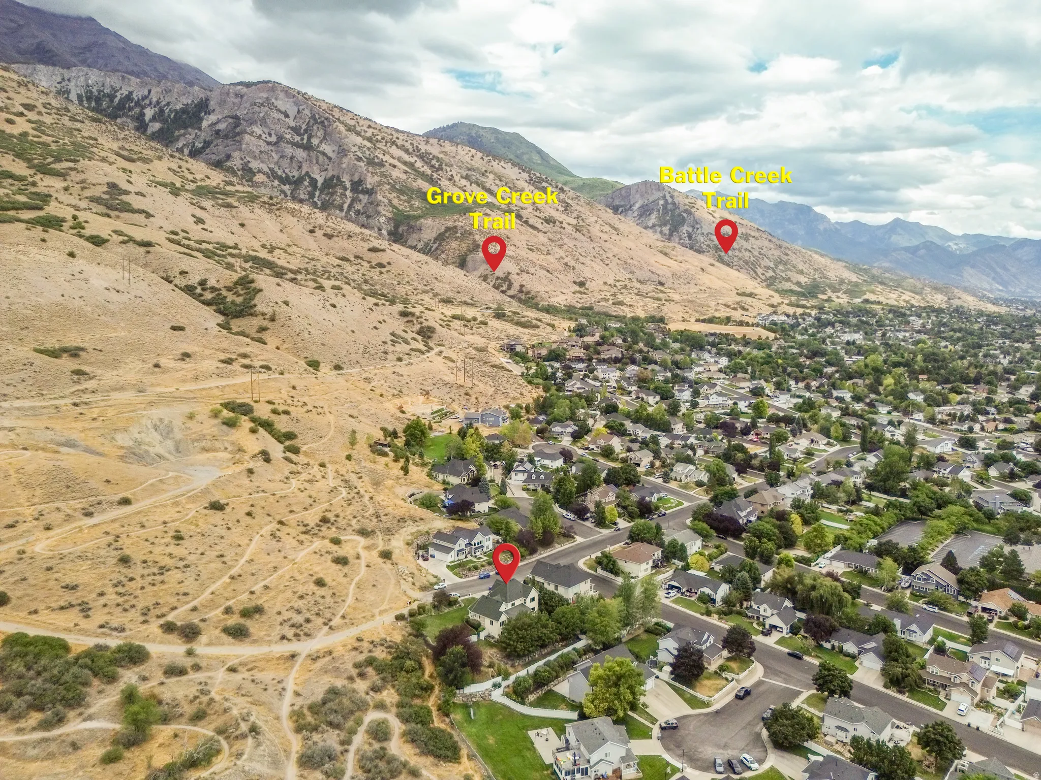 Aerial perspective featuring a residential area with varied housing styles