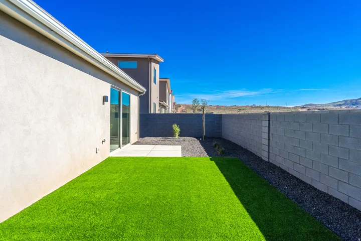 View of fenced backyard