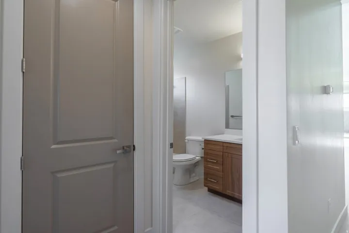 Bathroom featuring vanity and light tile patterned floors