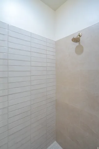 Bathroom with tiled shower