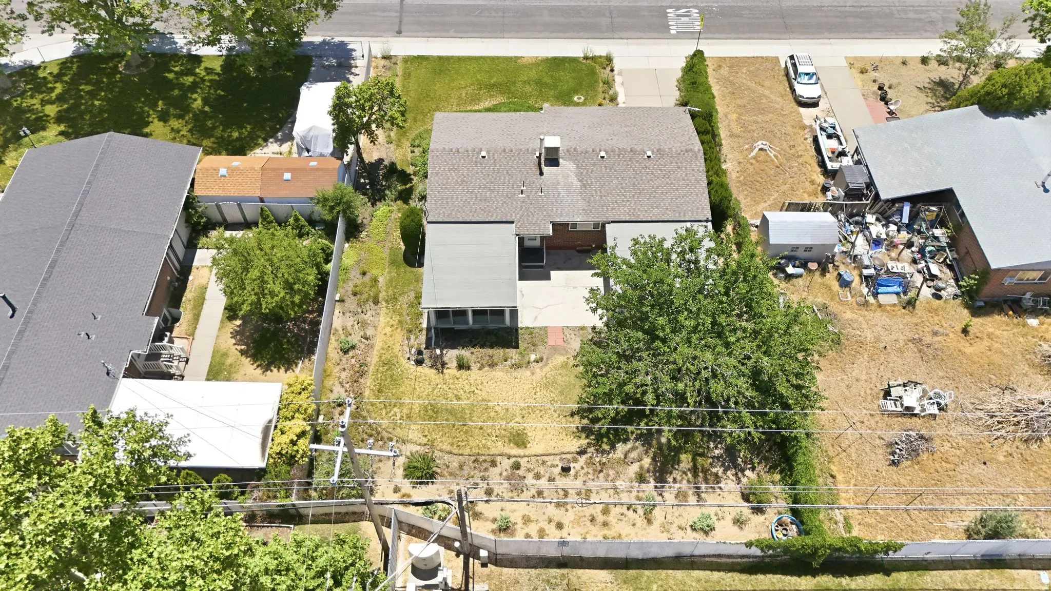 Property with a pitched roof and a rear covered patio