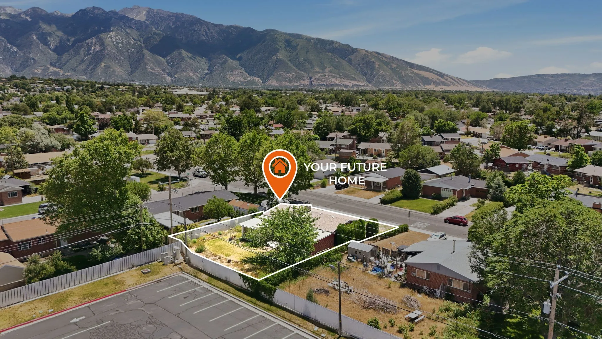 Aerial perspective showcasing a residential property with a defined lot outline