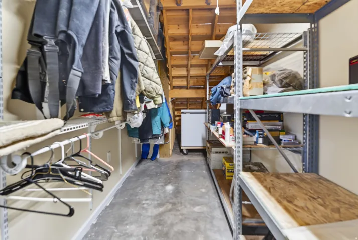 walk in closet/storage off of downstairs bedroom