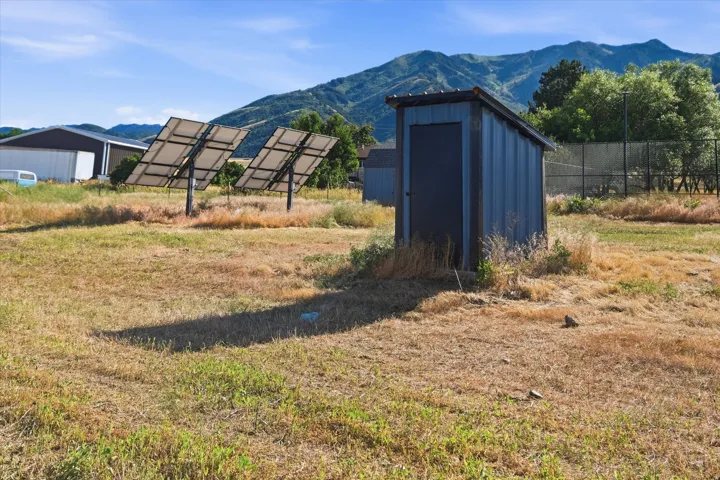 Exterior outbuilding with corrugated metal siding