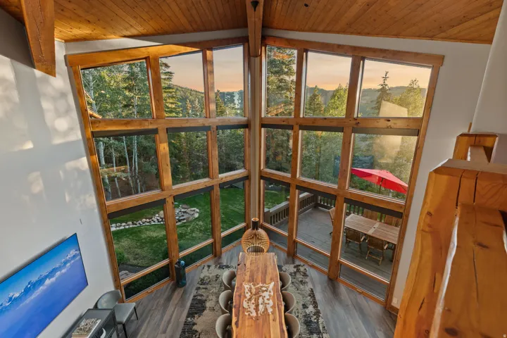 Soaring ceilings with exposed wood beams